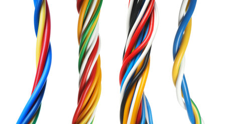 Different twisted electrical wires isolated on white, set