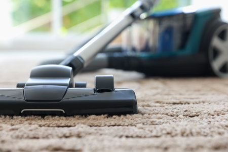 One vacuum cleaner on floor indoors, closeup