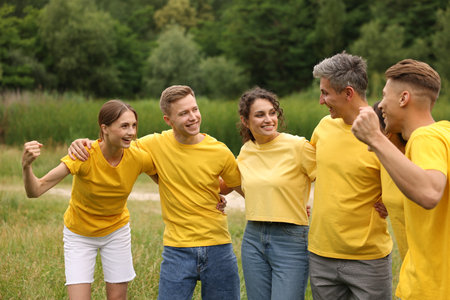 Team building. Group of happy people together outdoors