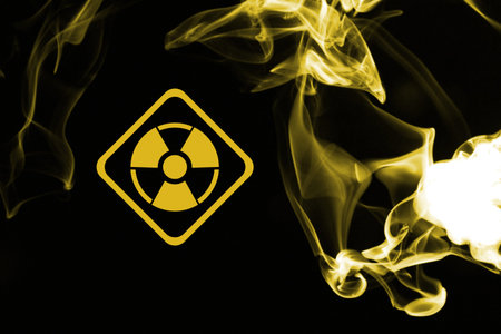 Radioactive sign and yellow toxic smoke against black background