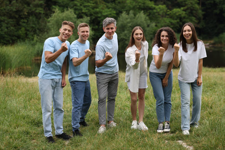 Team building. Group of happy people together outdoorsの写真素材