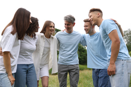Team building. Group of happy people together outdoors
