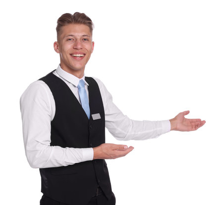Smiling receptionist in uniform welcoming on white background