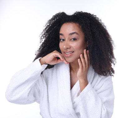 Beautiful Brazilian woman with healthy skin on white backgroundの写真素材