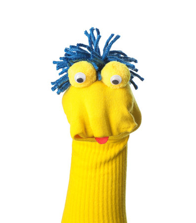 Funny sock puppet with hair isolated on whiteの写真素材