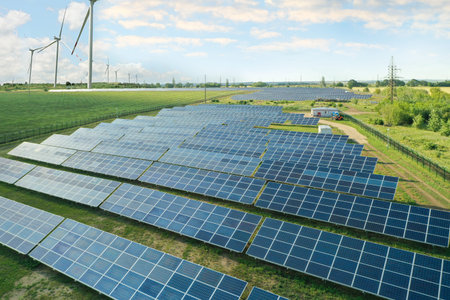 Solar panels and wind turbines outdoors. Alternative energy source