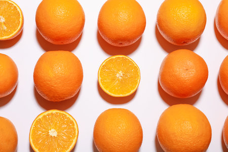 Fresh ripe oranges on white background, flat lay