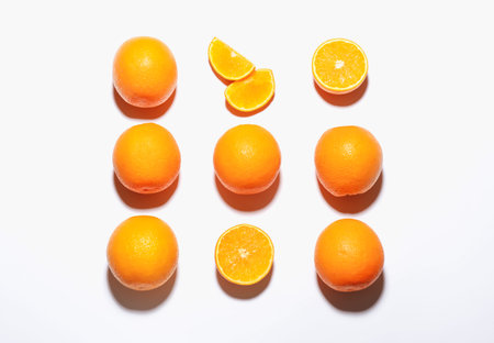 Fresh ripe oranges on white background, flat lay