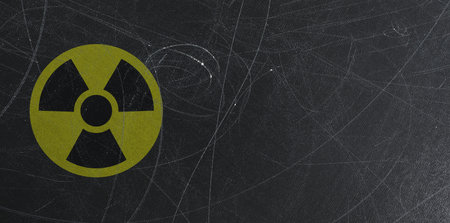 Yellow radioactive sign on scratched black background, banner design. Radiological pollution