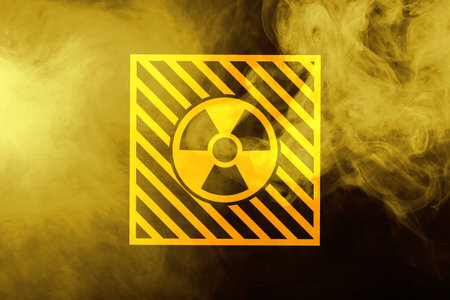 Radioactive sign and yellow toxic smoke against black background