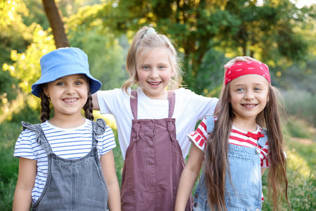 Portrait of cute little girls in natureの写真素材
