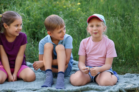 Children spending time in nature on summer dayの写真素材