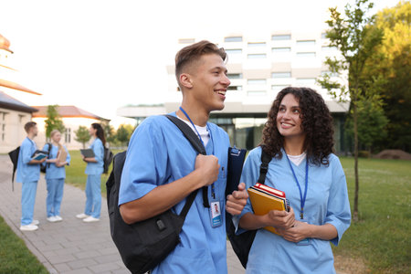 Medical students in uniforms outdoors, selective focusの写真素材