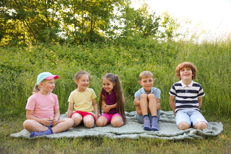 Children spending time in nature on summer dayの写真素材