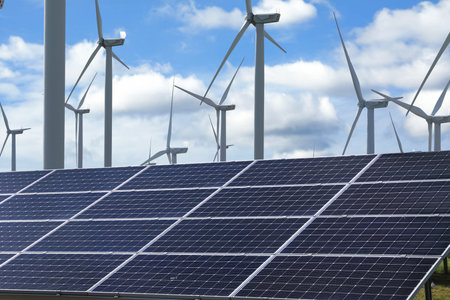 Solar panels and wind turbines outdoors. Alternative energy source