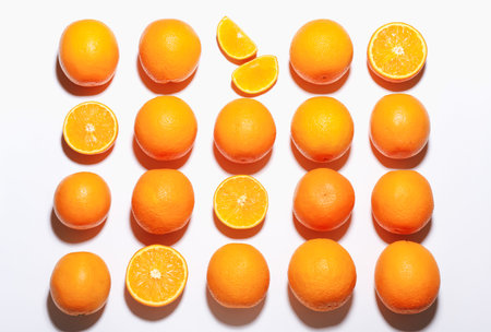 Fresh ripe oranges on white background, flat lay