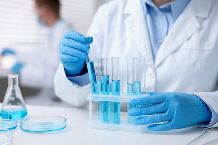 Medical analysis. Scientist working with samples in laboratory, selective focus