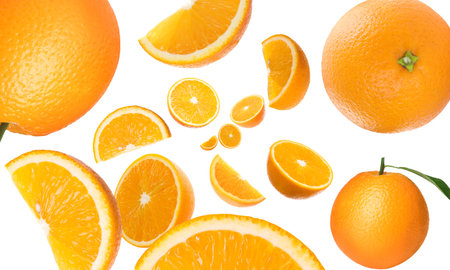 Fresh oranges swirling in air against white background. Citrus fruit