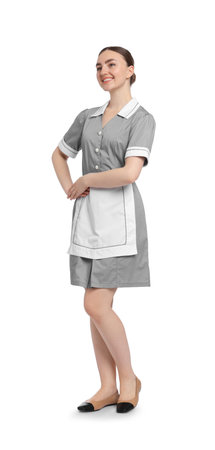 Full-length portrait of happy chambermaid on white backgroundの写真素材