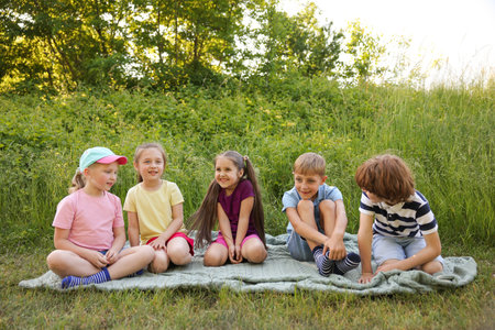 Children spending time in nature on summer dayの写真素材