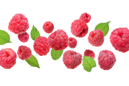 Fresh raspberries and green leaves flying against white background