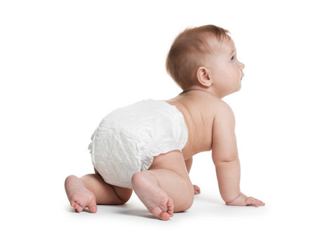 Cute little baby crawling on white backgroundの写真素材