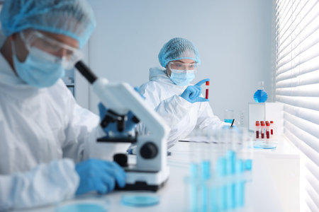 Medical analysis. Scientists working with samples in laboratory, selective focus