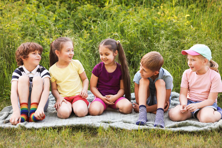 Children spending time in nature on summer dayの写真素材