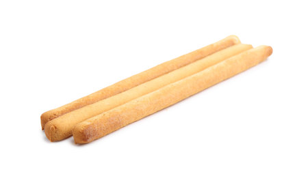 Three delicious grissini sticks isolated on white