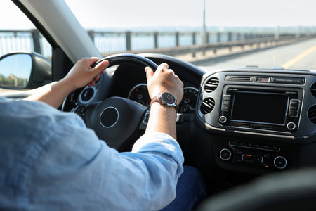 Man driving car with steering wheel, closeupのeditorial素材