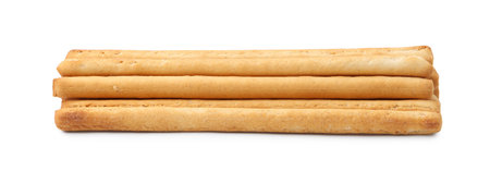 Many delicious grissini sticks isolated on white