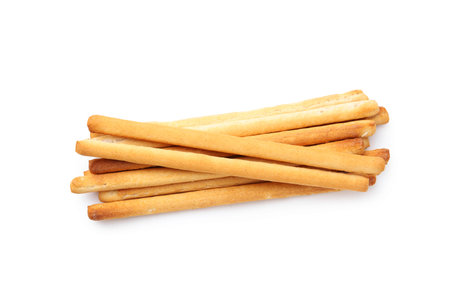Delicious grissini sticks isolated on white, top view