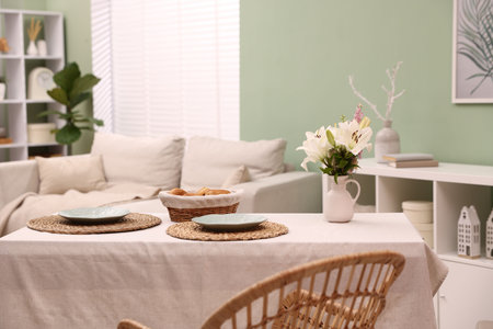 Stylish table with chair and decor in dining room. Interior design