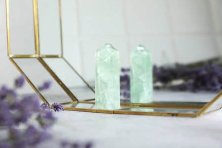 Beautiful fluorite and lavender on white table, closeup
