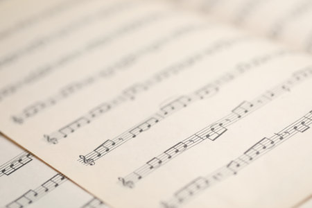 Sheets with musical notes as background, closeupの写真素材