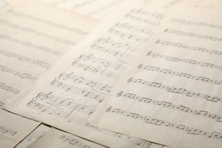 Sheets with musical notes as background, closeupの写真素材