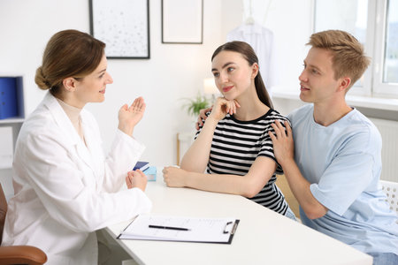 In vitro fertilization (IVF). Couple having appointment with doctor in reproductive clinicの写真素材