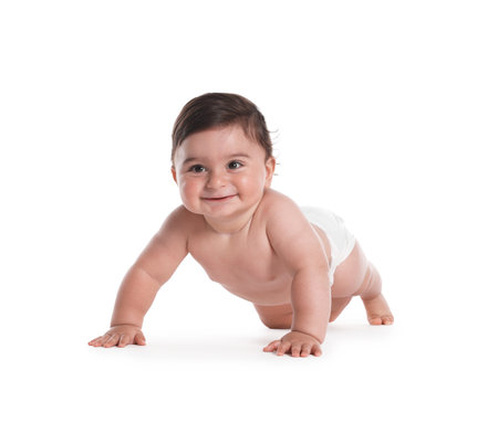 Cute little baby crawling on white backgroundの写真素材