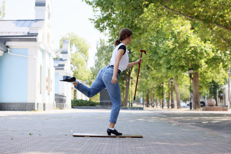 Teenage girl dancing outdoorsの写真素材