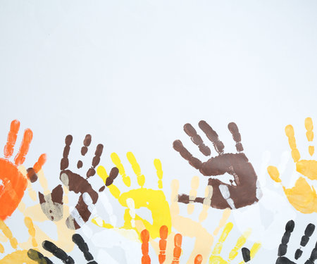 Tolerance concept. Colorful handprints on white background, flat lay. Space for textの写真素材