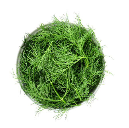 Fresh dill in bowl isolated on white, top viewの写真素材