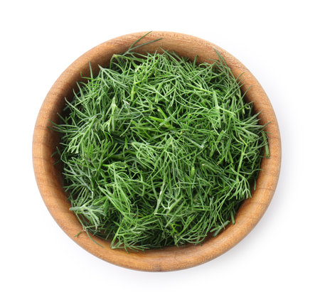Fresh cut dill in bowl isolated on white, top viewの写真素材