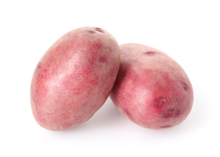 Fresh ripe red potatoes isolated on whiteの写真素材