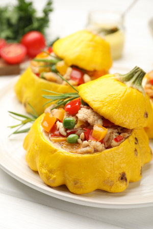 Tasty stuffed pattypan squashes on white table, closeupの写真素材