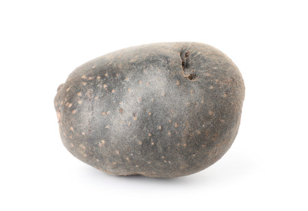 Fresh ripe purple potato isolated on whiteの写真素材