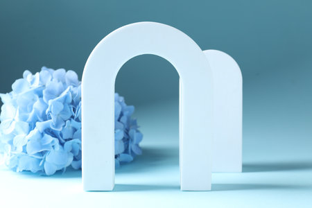 Promotion. White figures and cloth on light blue backgroundの写真素材