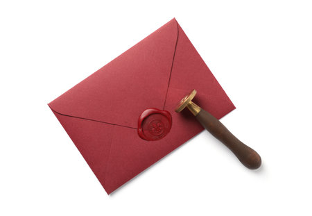 Envelope with wax seal and stamp isolated on white, top viewの写真素材
