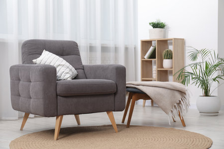 Comfortable grey armchair in living room. Interior designの写真素材