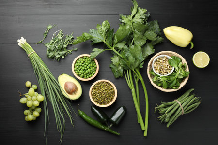 Superfood. Healthy food products on black wooden table, flat layの写真素材