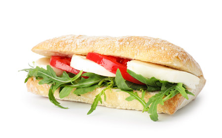 Delicious sandwich with mozzarella cheese, tomato and arugula isolated on whiteの写真素材